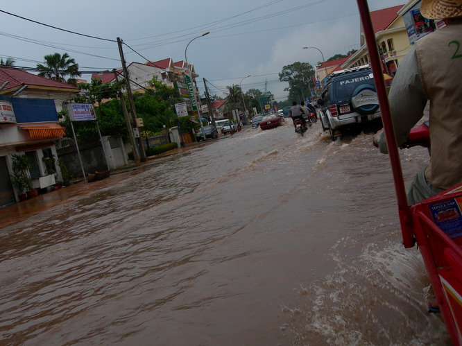 The streets of Siem Reap filled up quickly during an afternoon down pour. Siem Reap, Cambodia.