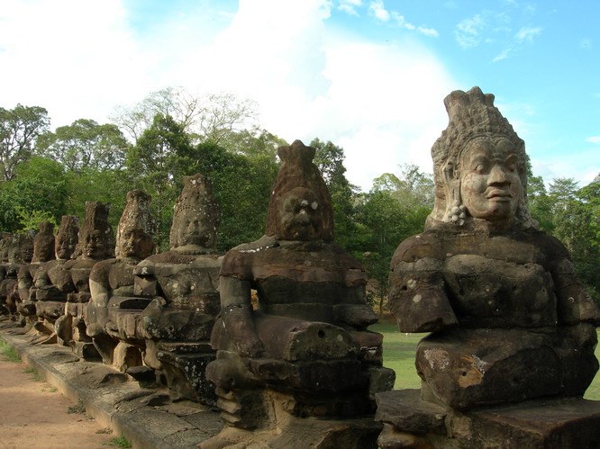 Stone guards that protect the temple gates. Angkor, Cambodia.