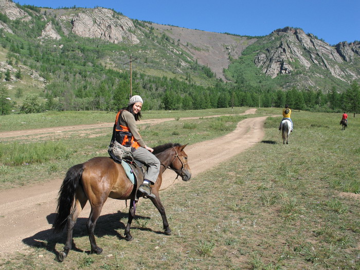 Zhang Qiao on horse back.
