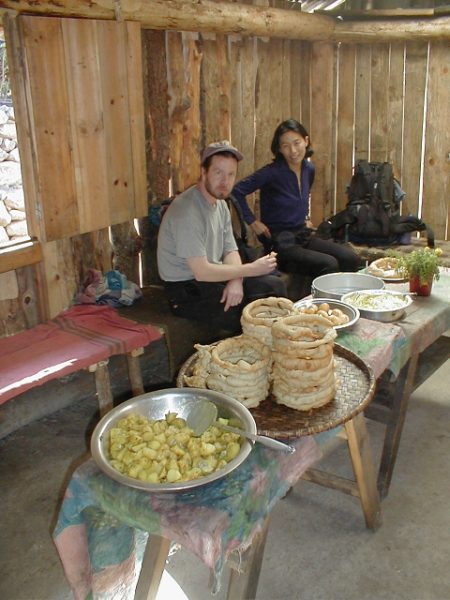 Ray and Liyang stopping in a tea house for a morning snack.