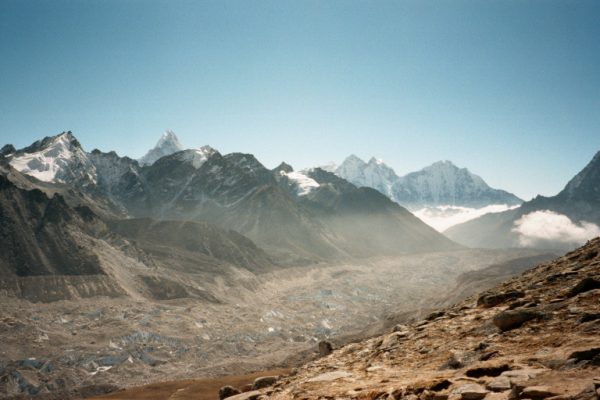 The Kumbu glacier. It is covered with gray rocky debris.