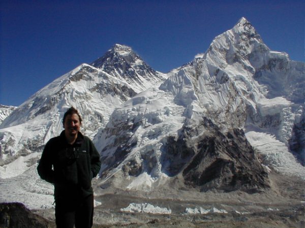 Leo in front of some big ice mountains.