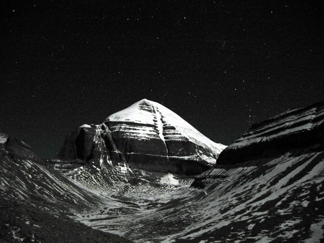 Mt. Kailash in the moonlight with the stars overhead. Mt. Kailash, Western Tibet.