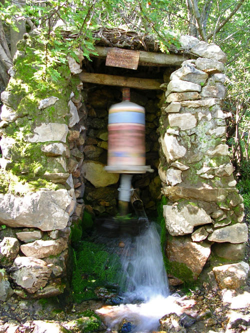 Water powered prayer wheel.