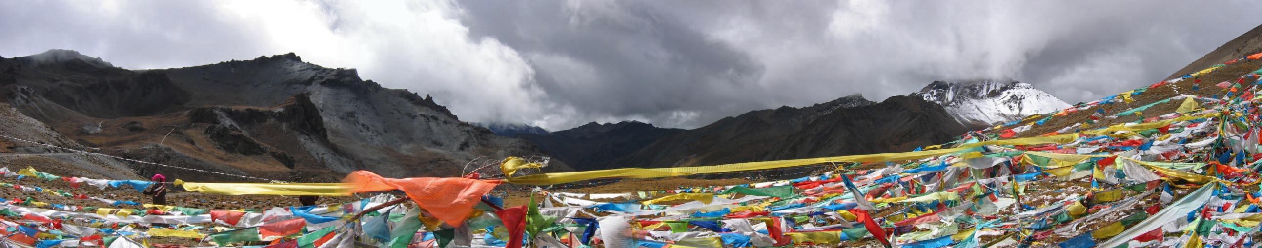 A typical Tibetan high mountain pass with lots of prayer flags, Tsari Tibet.