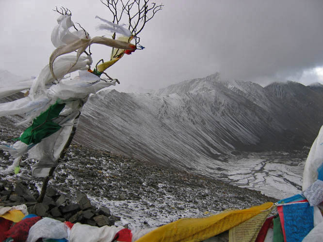 Prayer flags are always found at the tops of Tibetan mountain passes.