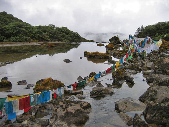Tibetan prayer flags are found all over the curcuit around Tsari.