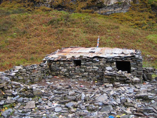 There are a number of basic stone pilgrim huts like this one on the curcuit around Dakpa Shelri..