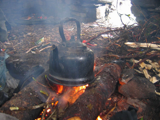 Cooking on a wood fire in a pilgrim hut on the Tsari curcuit.