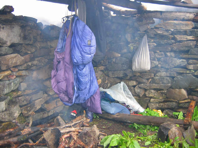After days and nights of rain everything I had was soaked including my sleeping bag. I took me a long time to make a fire with the wet wood and get some of my things dried out, so that I would not freeze in a wet sleeping bag.