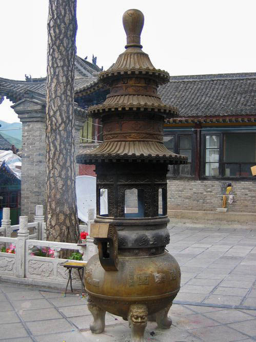 There large metal pots are for burning incense.