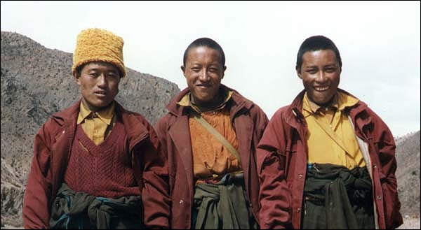 Three friendly monks in Eastern Tibet.