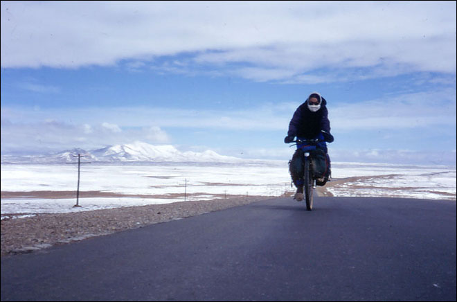 The cold weather and snow covered mountains made for great cycling, Amdo, Tibet.