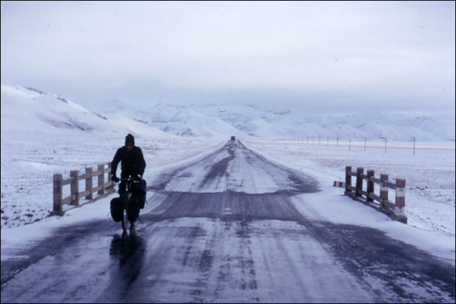 Most all of the goods sold in central Tibet are trucked in on this road. The truck traffic would keep the roads clear of snow. Amdo, Tibet.