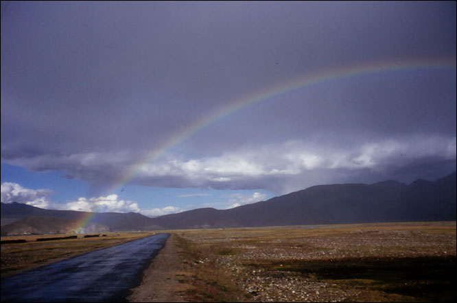 Weather on the Tibetan plateau changes by the minute. This would mean that we would often be treated to wonderful displays of rainbows. When we finally reached Lhasa, there was a rainbow over the Potala Palace. North Central Tibet.