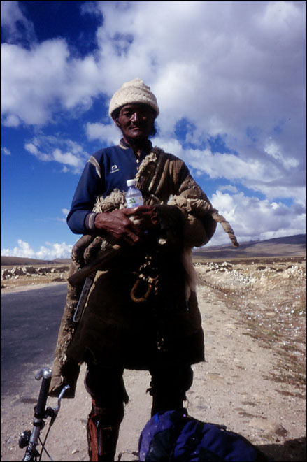 A Tibetan nomad that come over to see what these strange looking forienger were up to. North Central, Tibet.