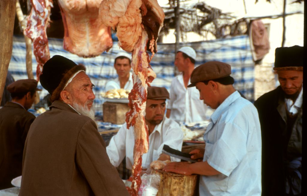   They say there are more than 100,000 people at the Sunday Market in Kashgar, and I would think at least that many sheep, both dead and alive. Kashgar, Xinjiang, China.
