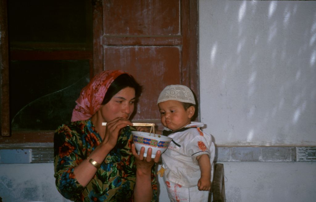 Noodle soup is the food staple for both young and old in this region. Kashgar, Xinjiang, China.