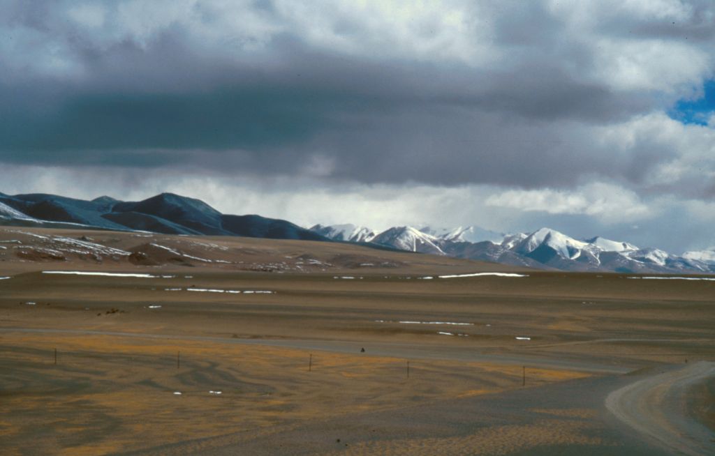   The distances in this kind of landscape where often deceptive. What would sometimes look like just a few minutes ride would sometimes end up taking the next 45 minutes. Askin Chin, Xinjiang, China.
