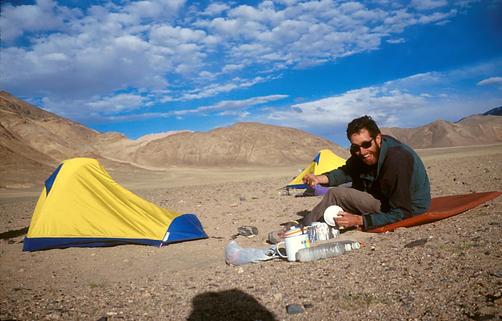 After a long day's ride, dinner was always a welcome treat. Each of us carried one of these small one person tents, that weigh about 2 pounds, and are just slightly larger than a sleeping bag. Askin Chin, Xinjiang, China.