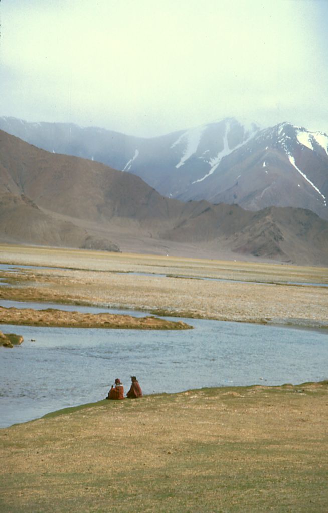 Pilgrims resting after a day of picnics and hiking. Domar, Tibet.
