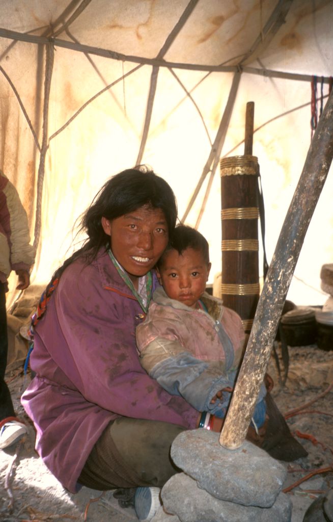 This nomad family hosted us for the afternoon. The fresh yogurt and tea was a welcome treat. We will always remember their great kindness and hospitality. South of Ali, Tibet.