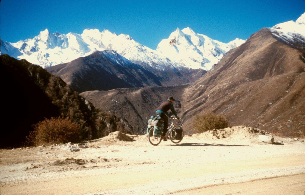 This part of the road marks the largest downhill in the world. It goes from an attitude of more than 17,000 feet down to only 2,000 feet. La Lung La, Tibet.
